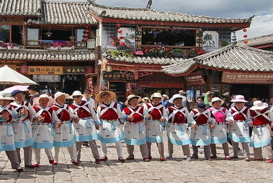 Lijiang 191010 Les femmes Naxi Lijiang Yunnan Chine